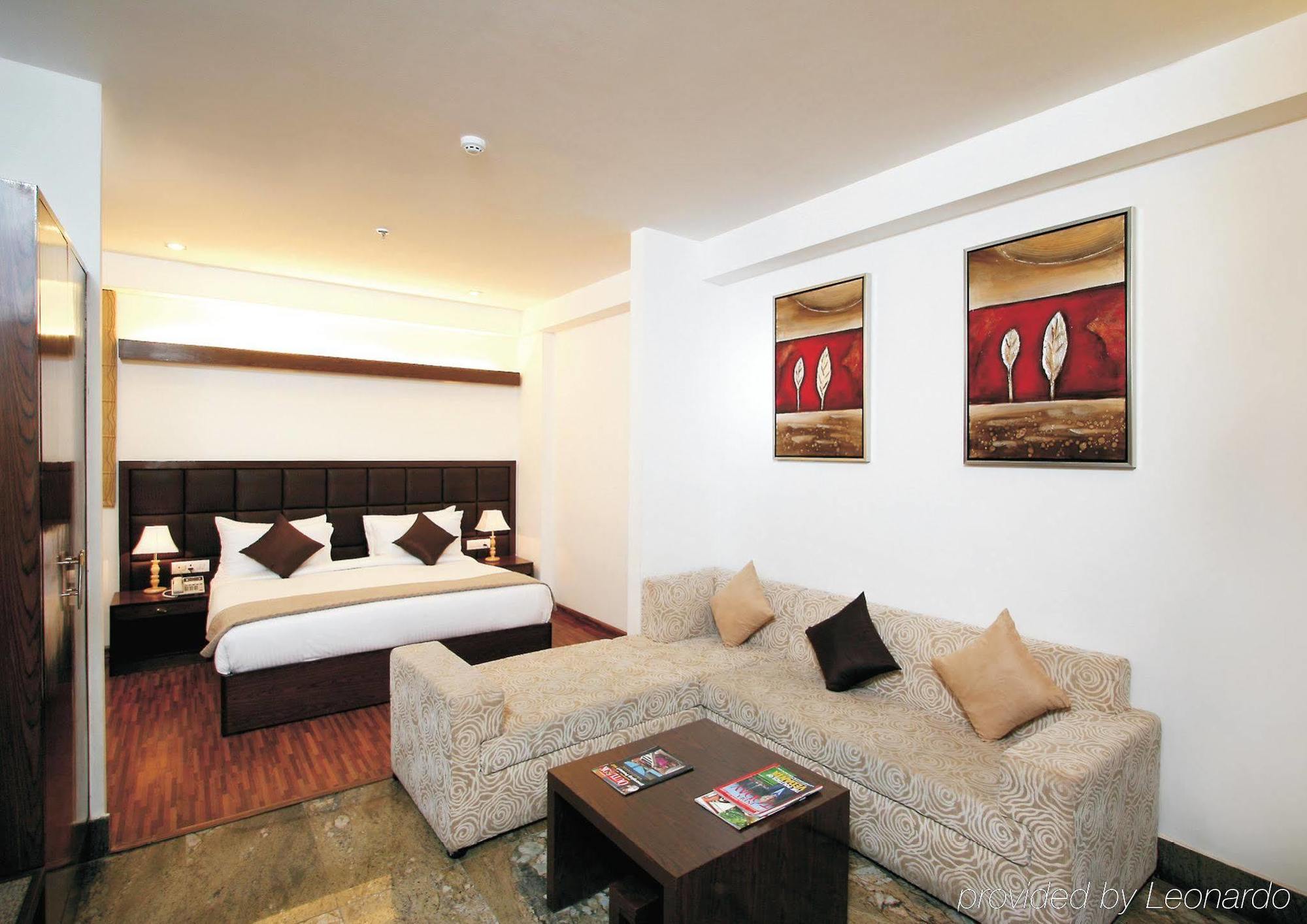 Taurus Sarovar Portico Нью-Дели Номер фото
